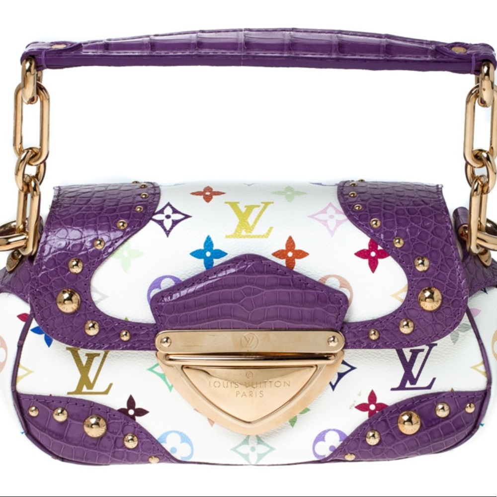 Authentic Vintage Louis Vuitton 


Alligator Monogram Multicolor Marilyn White